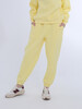 Брюки с начесом спортивные РОДИНА Оверсайз (женские) Молочно-Желтый фото