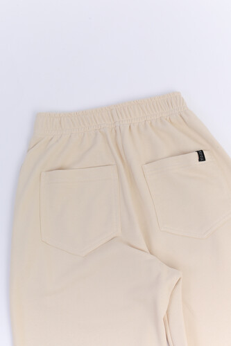 Брюки SEA-PEA СLOTHING зауженные (женские) Бежевый фото 9